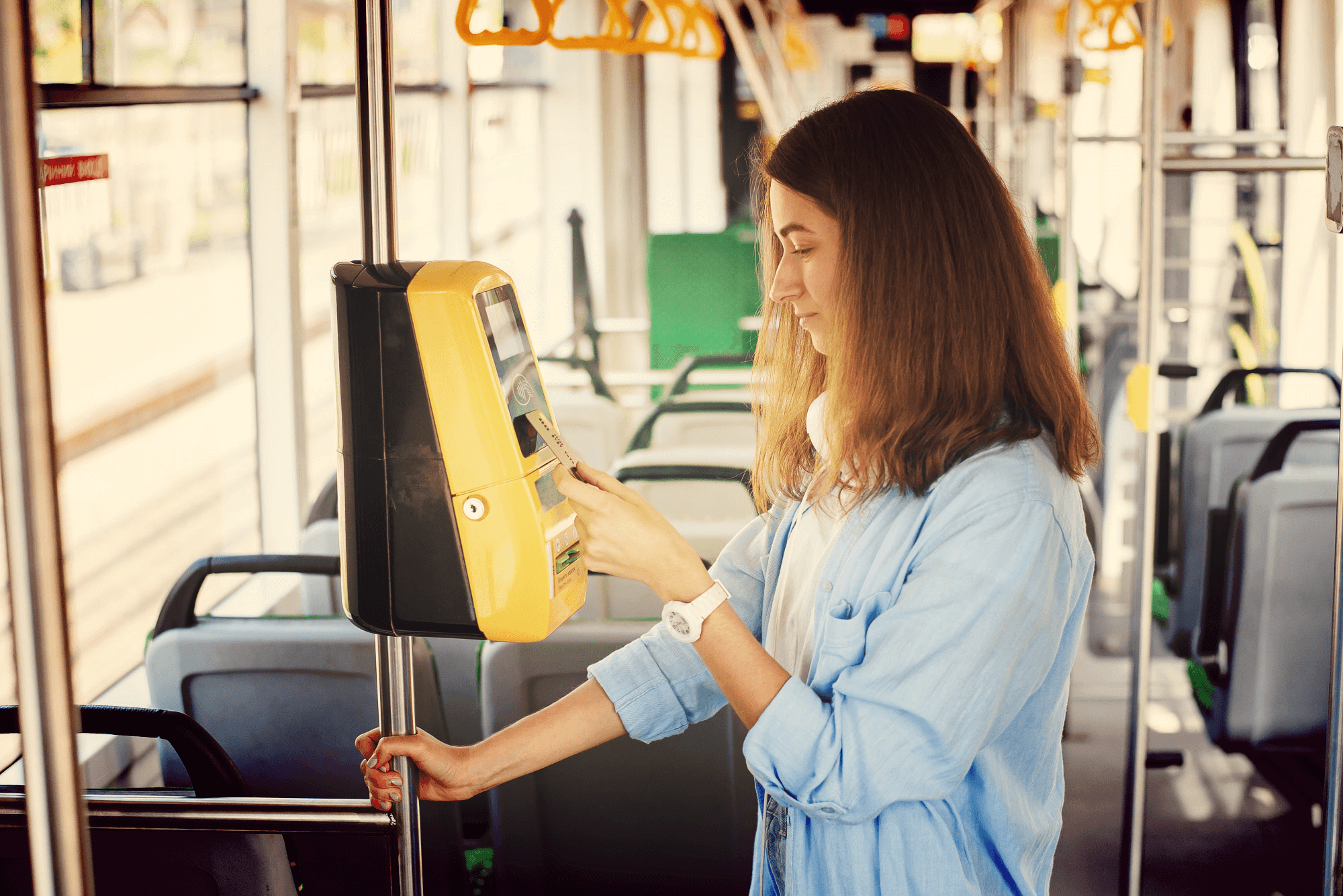 person using an Oyster card or tapping a contactless payment card
